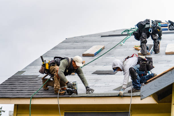 Professional Roofing technician working in Lincoln, MA